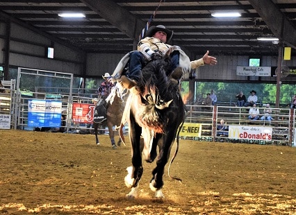 Lions Club Rodeo Bucks into Town